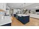 Spacious modern kitchen with large island and stainless steel appliances at 10517 Sable Cap Rd, Mint Hill, NC 28227
