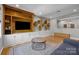 Stylish living room with custom built-ins and shelving at 10517 Sable Cap Rd, Mint Hill, NC 28227