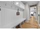 Mudroom area with built-in bench seating and storage at 10517 Sable Cap Rd, Mint Hill, NC 28227