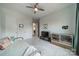 Bright bedroom with neutral decor, carpet, ceiling fan, and a view of the hallway and other living spaces at 1107 Castle Rd, Indian Land, SC 29707