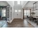 Elegant foyer with hardwood floors, high ceilings, and a view into the dining area at 1107 Castle Rd, Indian Land, SC 29707
