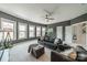 Spacious living room featuring modern furnishings, large windows offering ample natural light, and sleek design at 1107 Castle Rd, Indian Land, SC 29707