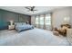 Spacious main bedroom features three windows, an accent wall, and a ceiling fan at 1107 Castle Rd, Indian Land, SC 29707