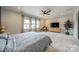Spacious main bedroom featuring multiple windows, neutral decor and a ceiling fan at 1107 Castle Rd, Indian Land, SC 29707