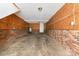 Unfinished basement featuring brick accents, offering potential for customization and expansion at 1108 Old Dallas Hwy, Dallas, NC 28034