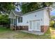A well-maintained single-story home with white siding, brick accents, and double-door entrance at 1108 Old Dallas Hwy, Dallas, NC 28034