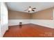 Inviting living room with beautiful wood floors, classic wainscoting, and ample natural light at 1108 Old Dallas Hwy, Dallas, NC 28034