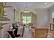 Cozy living room with neutral decor, comfortable seating, and natural light from the window at 116 S Broad St, Waxhaw, NC 28173