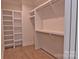 Well-organized walk-in closet with custom shelving and ample storage space at 116 S Broad St, Waxhaw, NC 28173