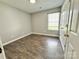 Comfortable bedroom featuring a window for natural light and wood-look flooring at 1252 Shenandoah Cir, Rock Hill, SC 29730