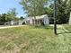Charming single-story home featuring a well-manicured lawn and inviting front porch at 1252 Shenandoah Cir, Rock Hill, SC 29730
