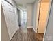 Bright hallway with wood-look floors leads to various rooms in the home at 1252 Shenandoah Cir, Rock Hill, SC 29730