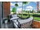 Cozy balcony with comfortable seating, potted plants, offering a relaxing outdoor space at 130 Rail Crossing Ln # 101, Charlotte, NC 28209