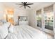 This bedroom has access to a balcony, an ensuite bathroom, and lots of natural light at 130 Rail Crossing Ln # 101, Charlotte, NC 28209