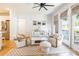 This living room has a modern aesthetic, neutral color palette, and lots of natural light at 130 Rail Crossing Ln # 101, Charlotte, NC 28209