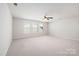 Bright bedroom features multiple windows at 14210 Asbury Park Rd, Huntersville, NC 28078