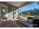 Covered patio with seating and fire pit, perfect for relaxing outdoors at 14210 Asbury Park Rd, Huntersville, NC 28078
