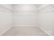 Spacious walk-in closet with ample shelving for organization at 14210 Asbury Park Rd, Huntersville, NC 28078