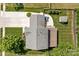 Aerial view of property showcasing the roof, shed, landscaped yard, and surrounding neighborhood at 150 Pleasant Grove Ln, Mooresville, NC 28115