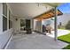 Covered patio with tiled flooring and an outdoor grill at 150 Pleasant Grove Ln, Mooresville, NC 28115
