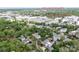 Scenic aerial view of a neighborhood showcasing lush green trees and community landmarks at 1517 Waverly Ave, Charlotte, NC 28203