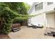 Private backyard with seating area, hot tub, and lush greenery offers a tranquil retreat at 1517 Waverly Ave, Charlotte, NC 28203