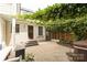 Paver patio with greenery and a hot tub offers a relaxing outdoor space at 1517 Waverly Ave, Charlotte, NC 28203