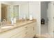 Spacious bathroom with granite countertops, double sinks, and an adjacent shower at 1517 Waverly Ave, Charlotte, NC 28203