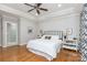 Inviting bedroom with hardwood floors and a comfortable king size bed at 1517 Waverly Ave, Charlotte, NC 28203