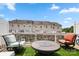 Back deck with outdoor seating and a view of the neighborhood at 15746 Marvin Rd, Charlotte, NC 28277