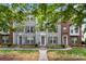 Charming townhome showcasing a well-manicured lawn and inviting facade at 15746 Marvin Rd, Charlotte, NC 28277