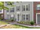 Charming townhome exterior showcasing well-manicured lawns and neutral toned accents at 15746 Marvin Rd, Charlotte, NC 28277