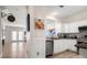 Cozy living room and well-equipped kitchen visible from each other at 15746 Marvin Rd, Charlotte, NC 28277