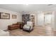 Relaxing living room features a bookcase and hardwood floors at 15746 Marvin Rd, Charlotte, NC 28277