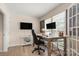 Well-lit office space with dual monitors, a modern desk, and comfortable seating at 15746 Marvin Rd, Charlotte, NC 28277