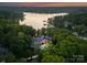 Luxury estate boasts beautiful lake views, lush landscaping, and a circular driveway at 172 Tennessee Cir, Mooresville, NC 28117