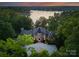 Luxury estate boasts beautiful lake views and lush landscaping at 172 Tennessee Cir, Mooresville, NC 28117