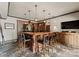 This home bar is spacious with seating for six and multiple cabinets for storage at 172 Tennessee Cir, Mooresville, NC 28117