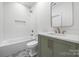 Bathroom features modern fixtures, a bathtub, and a stylish olive vanity at 1817 Union St, Charlotte, NC 28205