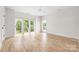 Bedroom features large windows offering abundant natural light and verdant views at 1817 Union St, Charlotte, NC 28205