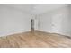 Bedroom boasts hardwood floors, natural light, and multiple doorways at 1817 Union St, Charlotte, NC 28205