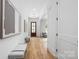 Bright, inviting hallway with wood floors and modern decor; a welcoming entrance to the home at 1817 Union St, Charlotte, NC 28205