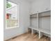 Organized mudroom with custom built-ins, bench seating, and ample storage perfect for busy families at 1817 Union St, Charlotte, NC 28205
