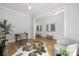 Bright office space with wood floors, ample natural light and comfortable seating perfect for working from home at 1817 Union St, Charlotte, NC 28205