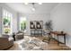Bright office space with wood floors, ample natural light and comfortable seating perfect for working from home at 1817 Union St, Charlotte, NC 28205