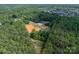 High angle aerial view of the neighborhood and house in the middle of the property at 2003 Briarwood Cir, Fort Mill, SC 29715