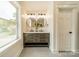 Bright bathroom featuring dual sinks with modern fixtures and decor at 2003 Briarwood Cir, Fort Mill, SC 29715