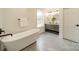 Modern bathroom featuring a freestanding tub, dual vanities, and stylish fixtures at 2003 Briarwood Cir, Fort Mill, SC 29715