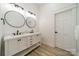 Bathroom with dual sinks, modern lighting, and fixtures at 2003 Briarwood Cir, Fort Mill, SC 29715
