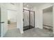 Modern bathroom boasting a glass-enclosed shower with marble-style walls at 2003 Briarwood Cir, Fort Mill, SC 29715